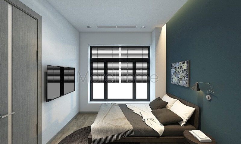 Bố trí nội thất phòng ngủ nhỏ đơn giản, phần vách tường đầu giường được dán giấy dán tường màu xanh lạ mắt tạo điểm nhấn ấn tượng cho không gian không quá đơn điệu